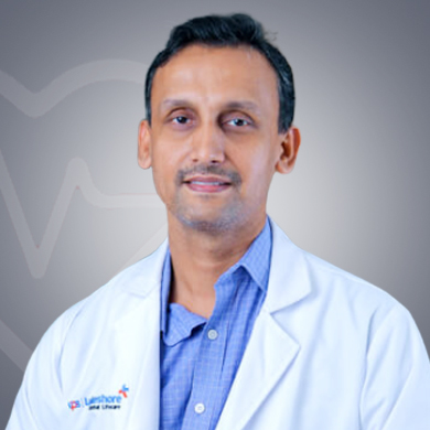 Dr. Mahesh S